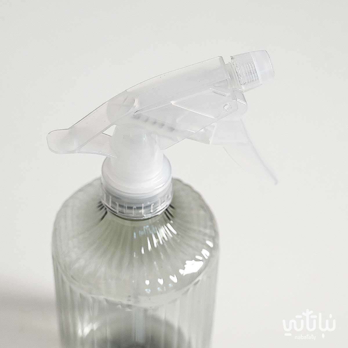 A small transparent grey striped spray bottle 2