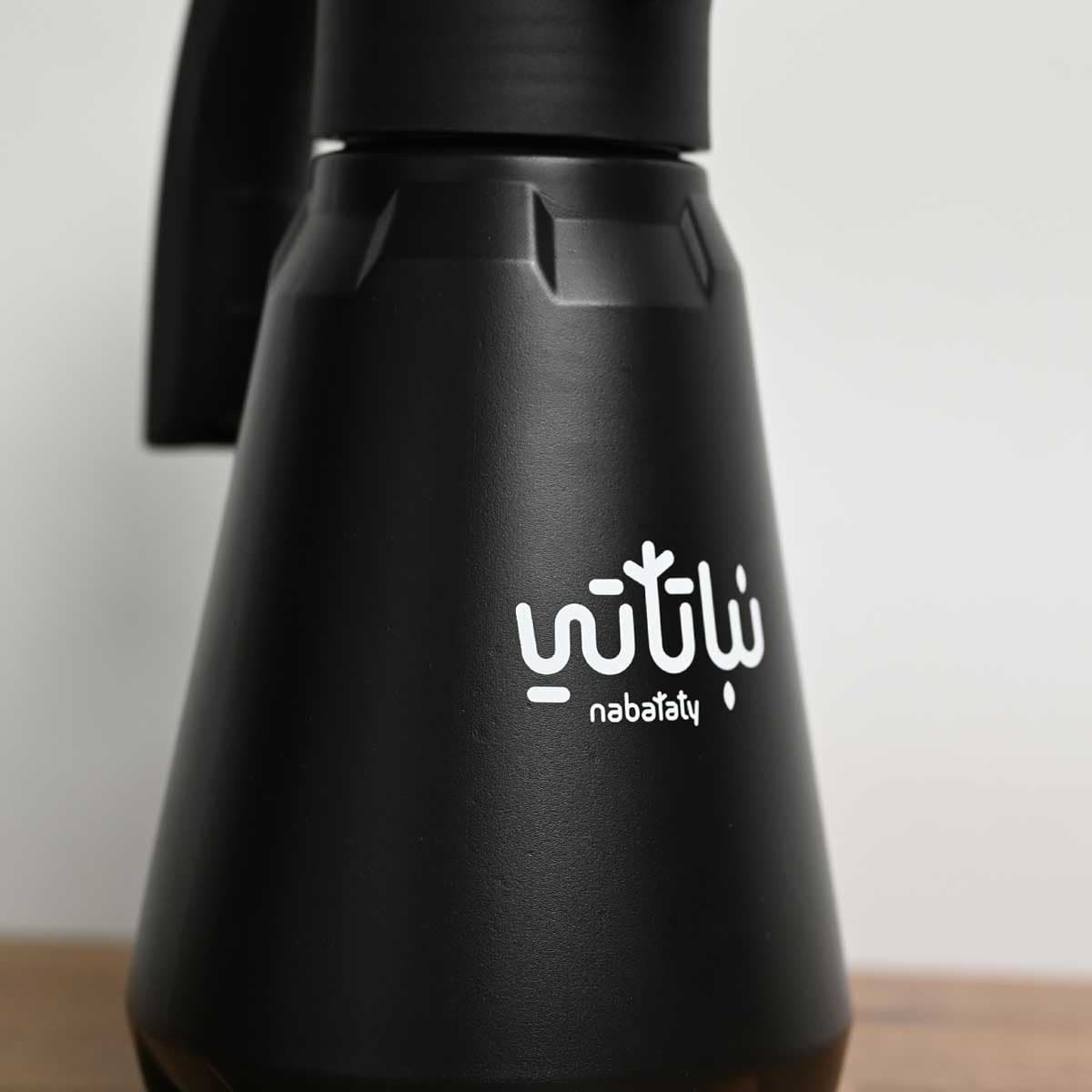 رشاش ماء اسود شعار نباتاتي 1.5 لتر 2